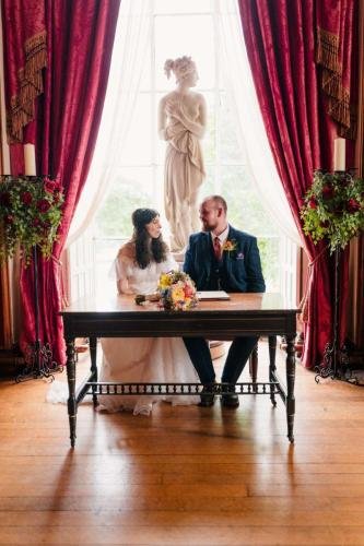 Bride and groom looking at each other