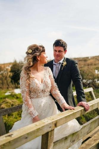 Bride and groom on the bridge 